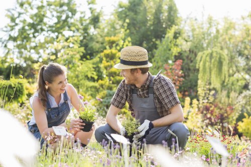 Maintenance crew performing seasonal garden care