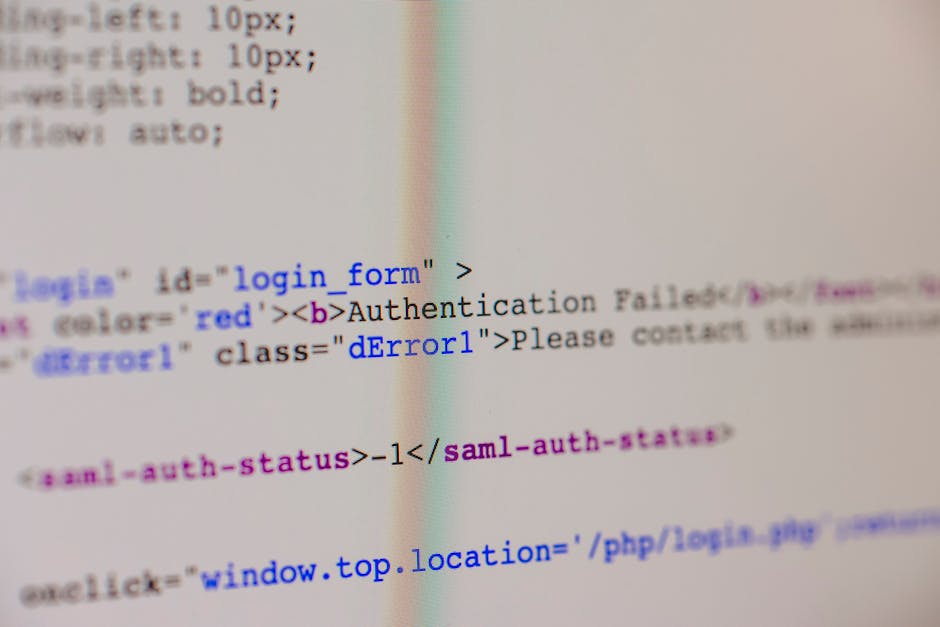 A close-up view of a computer screen displaying HTML code with tags such as 'login form' and error messages in various colors including blue, violet, and red. The background is slightly blurred, focus